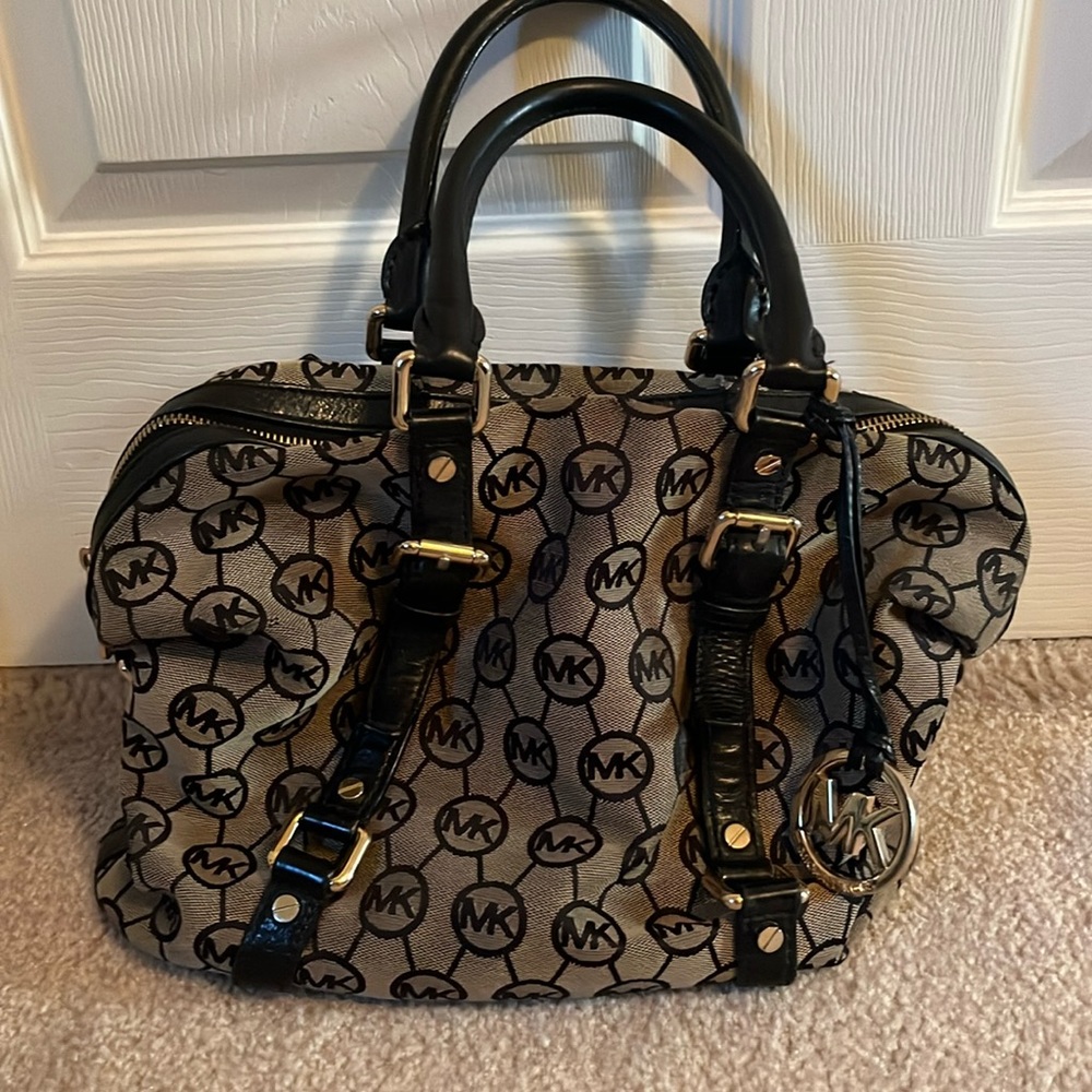 Michael Kors black and tan purse